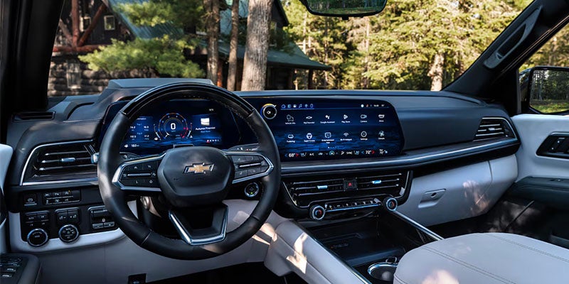 Modern Chevrolet Traverse interior featuring a digital dashboard and large infotainment screen