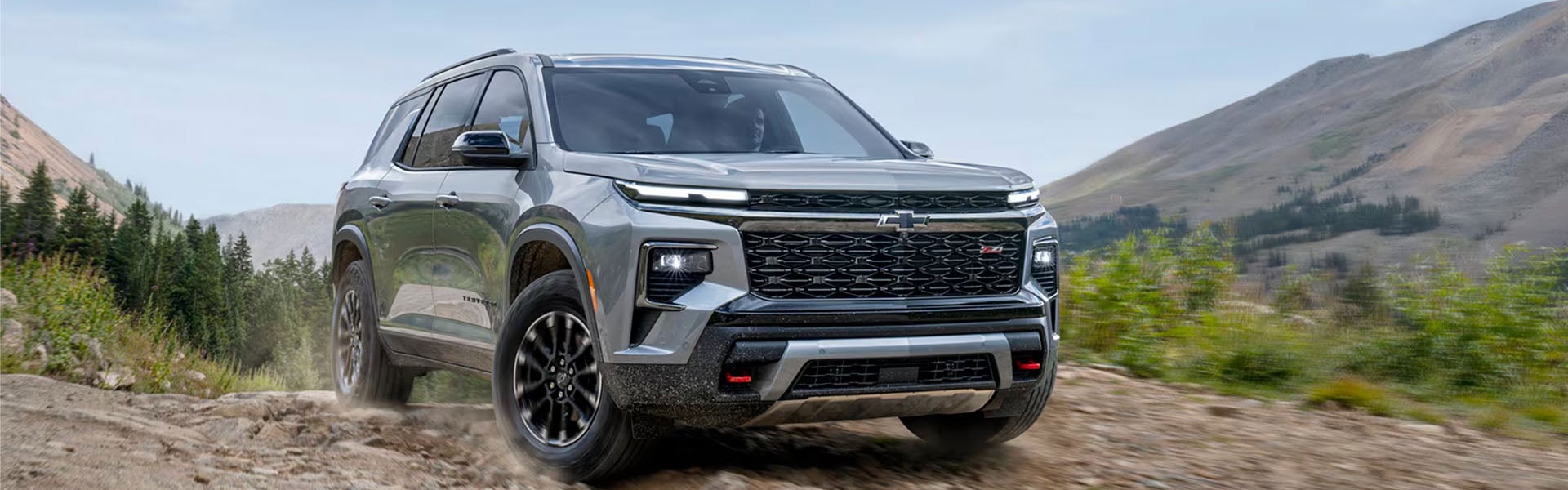 2027 Chevrolet Traverse shown from a front three-quarter angle on an open road