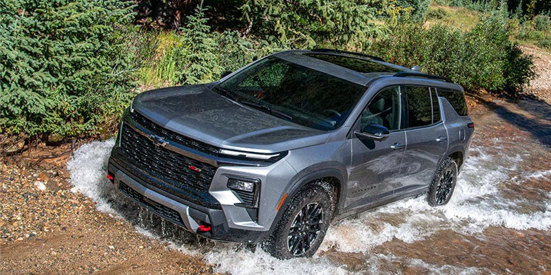 2027 Chevrolet Traverse on a rugged trail outside Tulsa, front three-quarter view