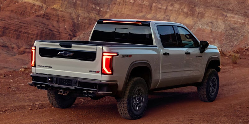 2027 Chevrolet Silverado 1500 ZR2 rear three-quarter on trail