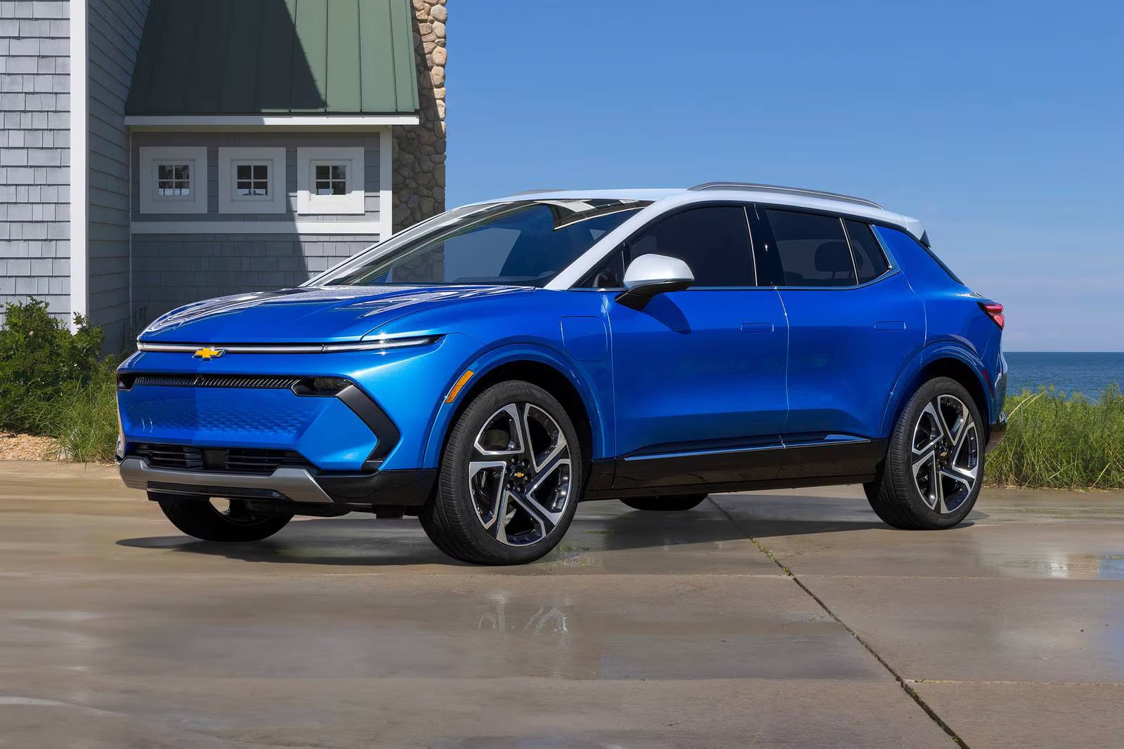 2026 Chevrolet Equinox EV parked out in front of a home